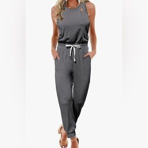 NWT grey jogger style jumpsuit with cut out detail